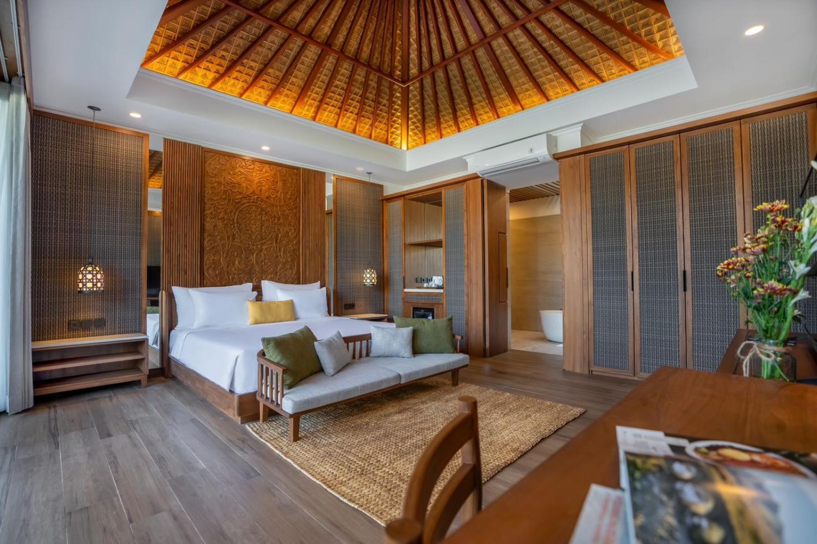 Nirwana Beach & Resort Candidasa Esterno foto A bedroom at the resort