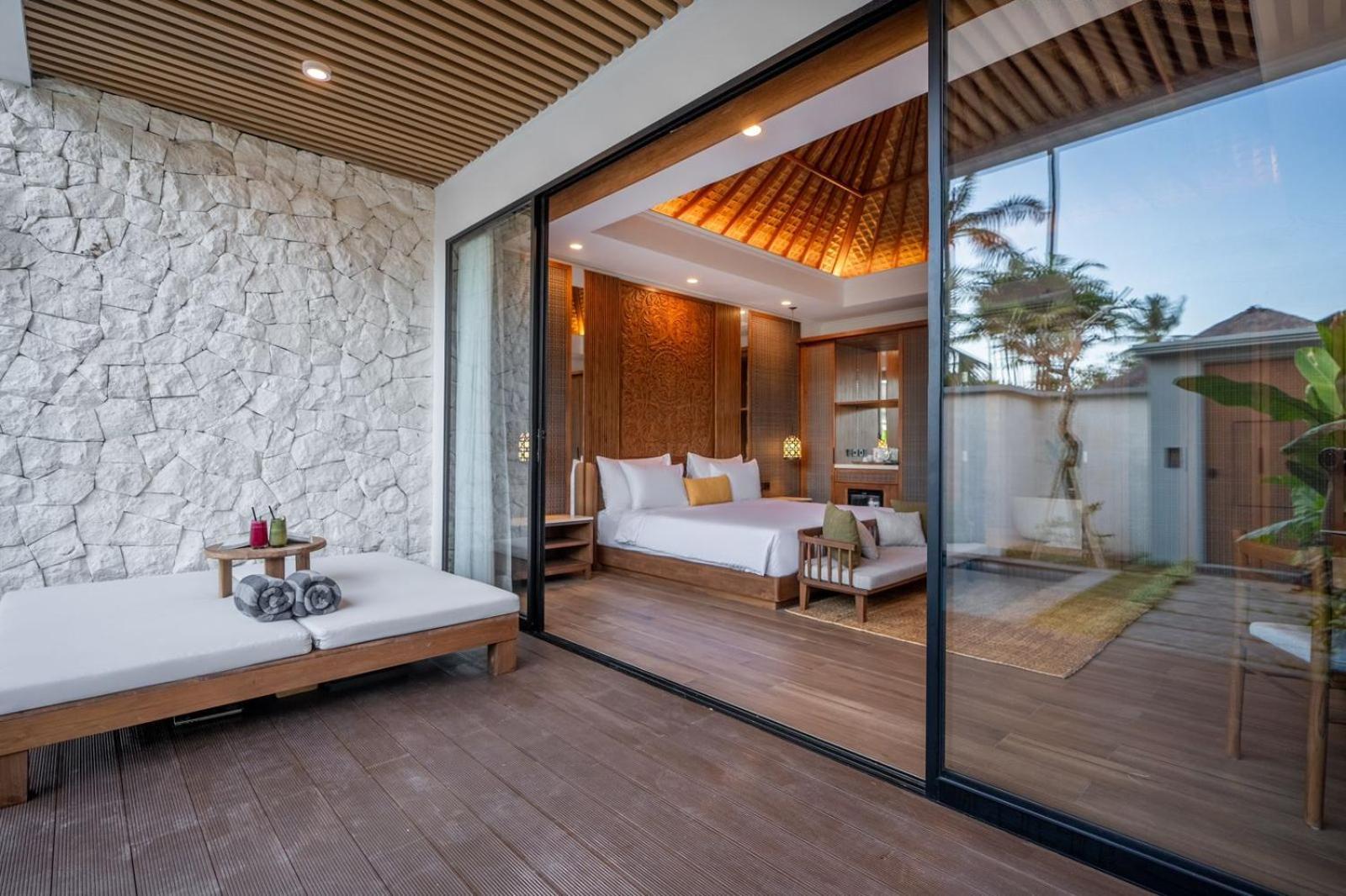 Nirwana Beach & Resort Candidasa Esterno foto A bedroom at the resort