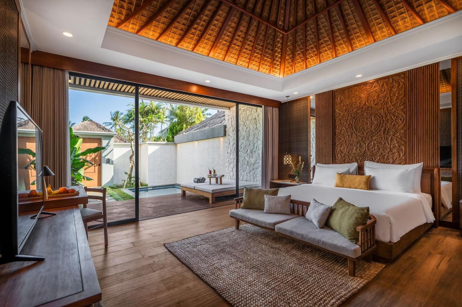 Nirwana Beach & Resort Candidasa Esterno foto A bedroom at the hotel