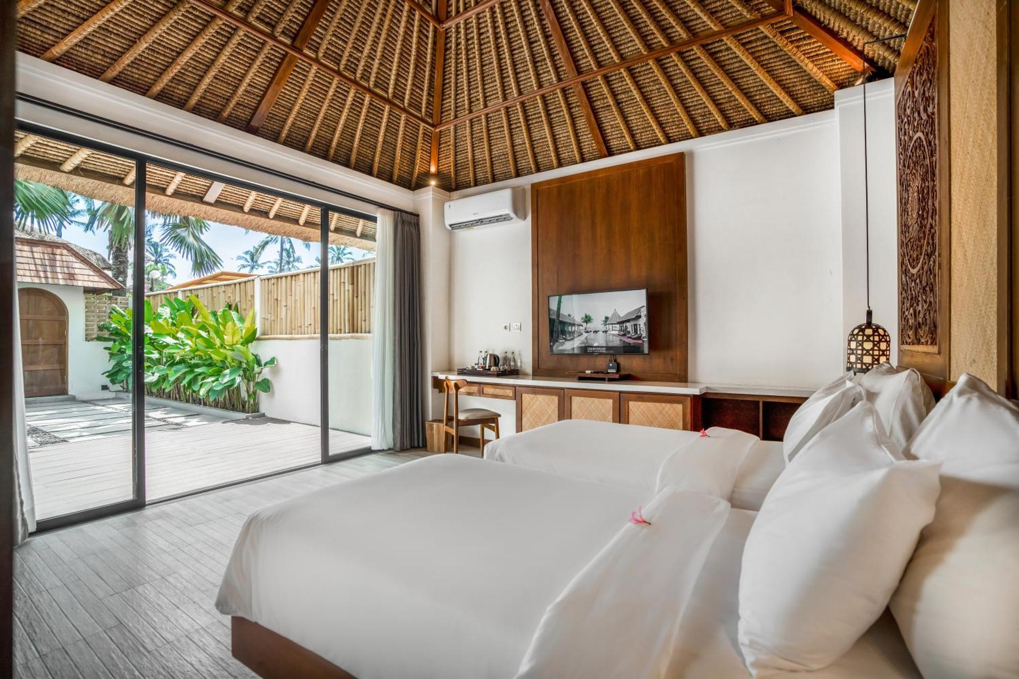 Nirwana Beach & Resort Candidasa Esterno foto Deluxe Beachfront Villa