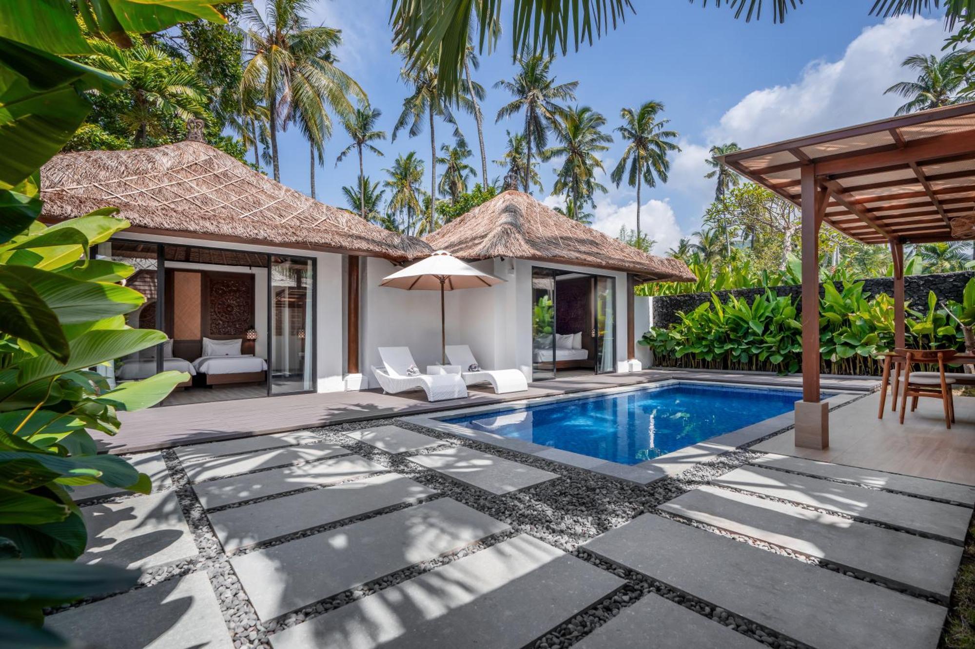 Nirwana Beach & Resort Candidasa Esterno foto A villa at the resort
